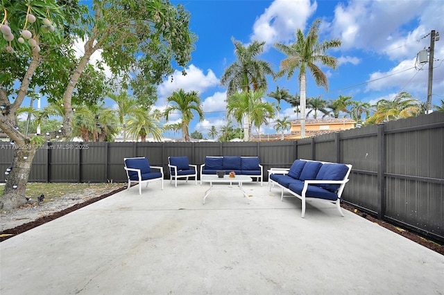 view of patio / terrace featuring outdoor lounge area and a fenced backyard