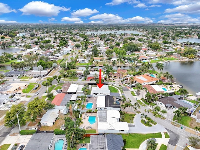 bird's eye view with a water view and a residential view