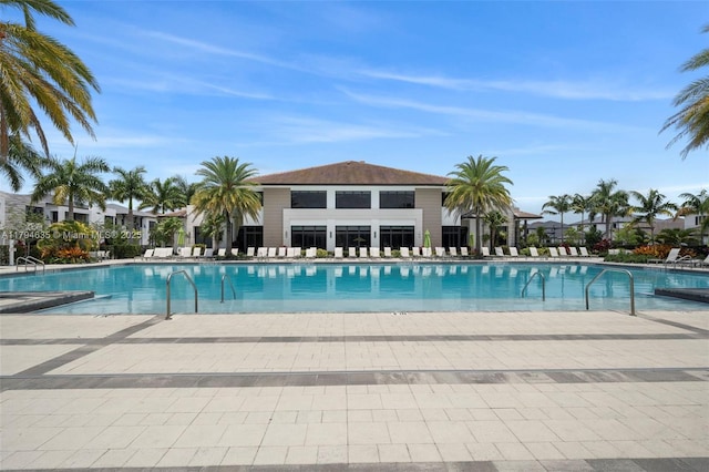 pool with a patio area