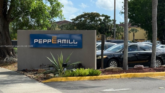 view of community sign