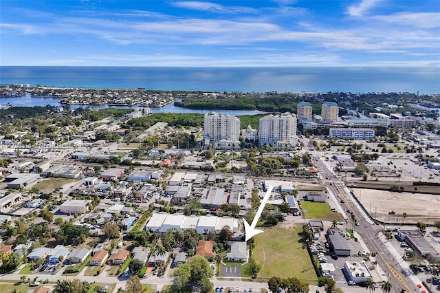 aerial view featuring a city view and a water view