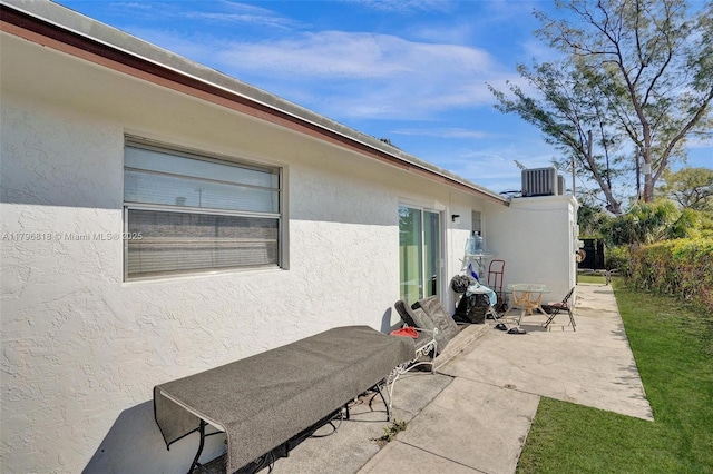 view of patio featuring central AC unit