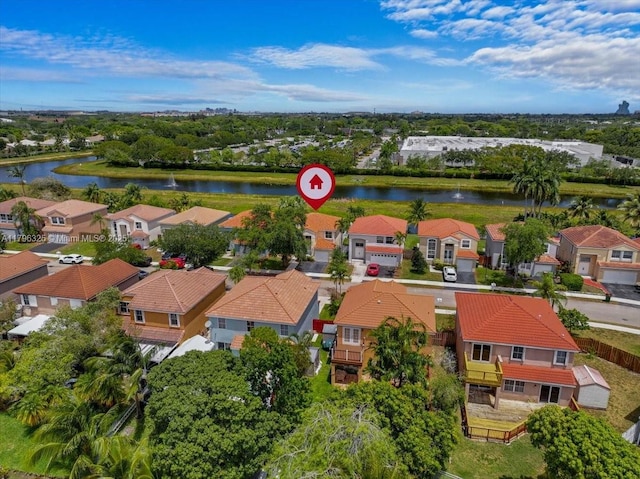 aerial view with a water view and a residential view