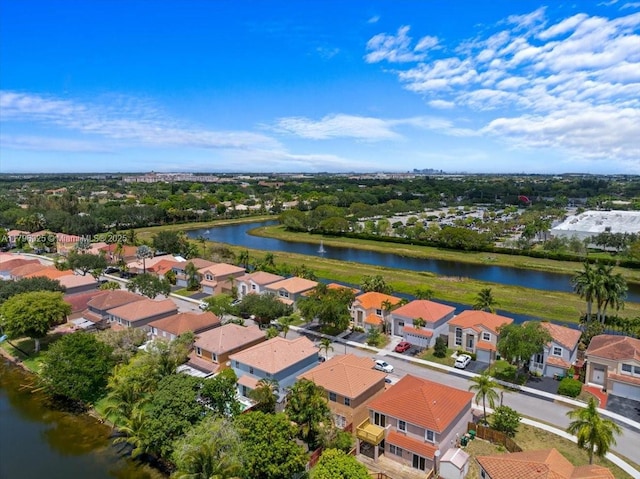 aerial view featuring a water view and a residential view