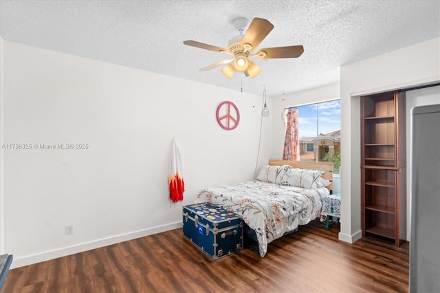 4370 SW 82nd Way, Davie, FL 33328 - bedroom with baseboards, a textured ceiling, and wood finished floors
