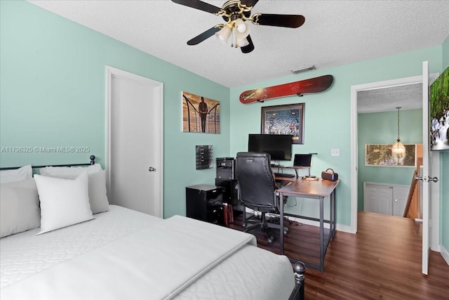 4370 SW 82nd Way, Davie, FL 33328 - bedroom featuring a textured ceiling, wood finished floors, a desk, baseboards, and ceiling fan