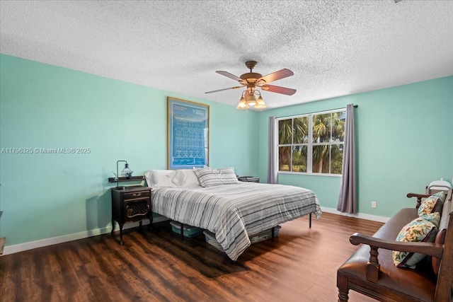 4370 SW 82nd Way, Davie, FL 33328 - bedroom with baseboards, ceiling fan, a textured ceiling, and wood finished floors
