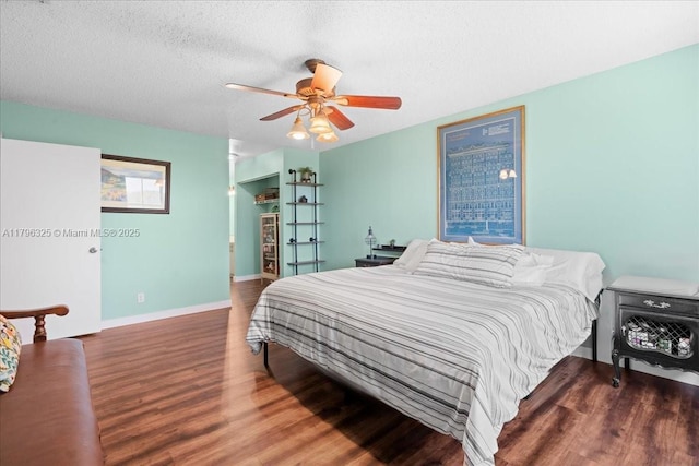 4370 SW 82nd Way, Davie, FL 33328 - bedroom with a ceiling fan, wood finished floors, baseboards, and a textured ceiling