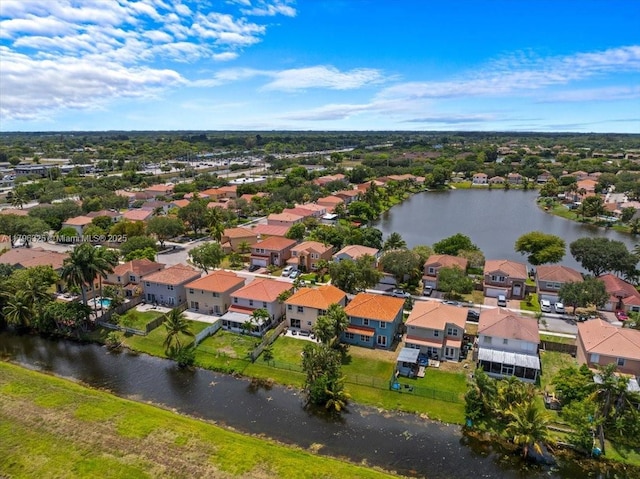 aerial view with a water view and a residential view