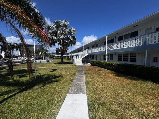 801 Atlantic Shores Blvd Unit 115, Hallandale Beach, FL 33009 - view of home's community with a lawn
