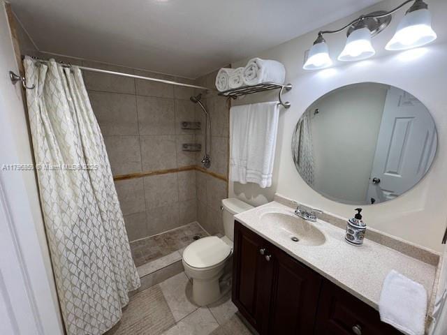 14 Westbury A 14, Deerfield Beach, FL 33442 - full bathroom featuring tile patterned floors, vanity, toilet, and a tile shower