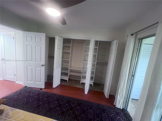 14 Westbury A 14, Deerfield Beach, FL 33442 - unfurnished bedroom featuring a ceiling fan and ornamental molding