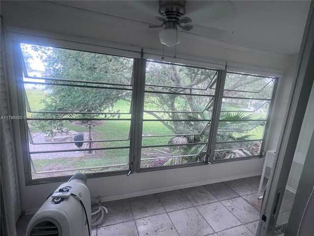 14 Westbury A 14, Deerfield Beach, FL 33442 - dining space featuring baseboards, a healthy amount of sunlight, and ceiling fan