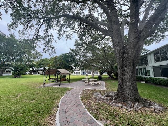 14 Westbury A 14, Deerfield Beach, FL 33442 - view of home's community featuring a lawn