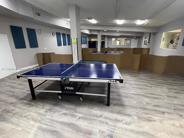 14 Westbury A 14, Deerfield Beach, FL 33442 - game room with visible vents and wood finished floors