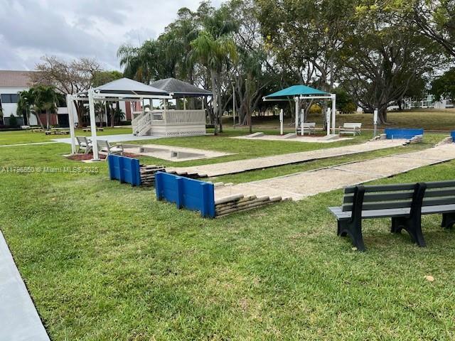 14 Westbury A 14, Deerfield Beach, FL 33442 - view of community with a gazebo and a lawn
