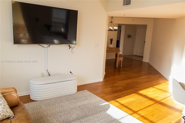 520 SE 5th Ave Unit 3302, Fort Lauderdale, FL 33301 - corridor featuring visible vents, light wood-style flooring, baseboards, and a notable chandelier