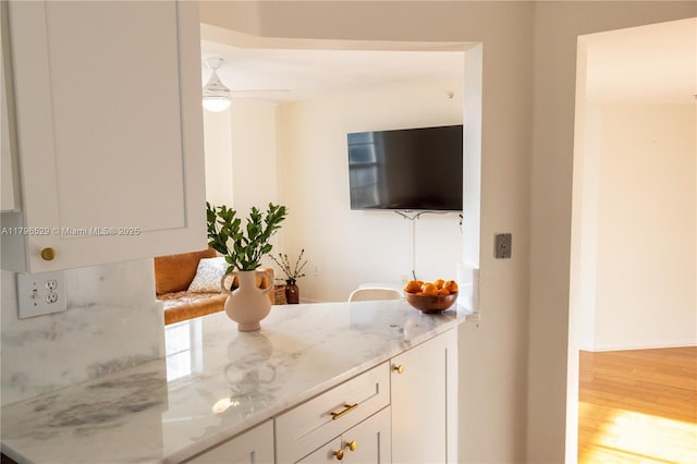 520 SE 5th Ave Unit 3302, Fort Lauderdale, FL 33301 - bar featuring wood finished floors, baseboards, and ceiling fan