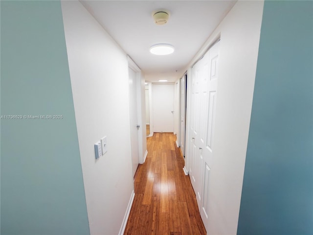 520 SE 5th Ave Unit 3302, Fort Lauderdale, FL 33301 - hall featuring baseboards and hardwood / wood-style floors