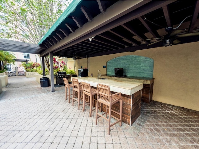 520 SE 5th Ave Unit 3302, Fort Lauderdale, FL 33301 - view of patio / terrace featuring a sink, grilling area, a ceiling fan, and outdoor wet bar
