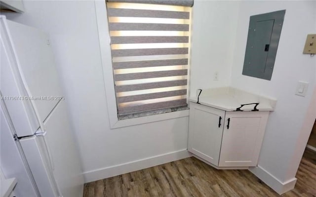 3688 N University Dr Unit H-3, Coral Springs, FL 33065 - interior space with electric panel, baseboards, and light wood-type flooring