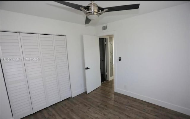 3688 N University Dr Unit H-3, Coral Springs, FL 33065 - unfurnished bedroom with wood finished floors, a closet, visible vents, baseboards, and ceiling fan