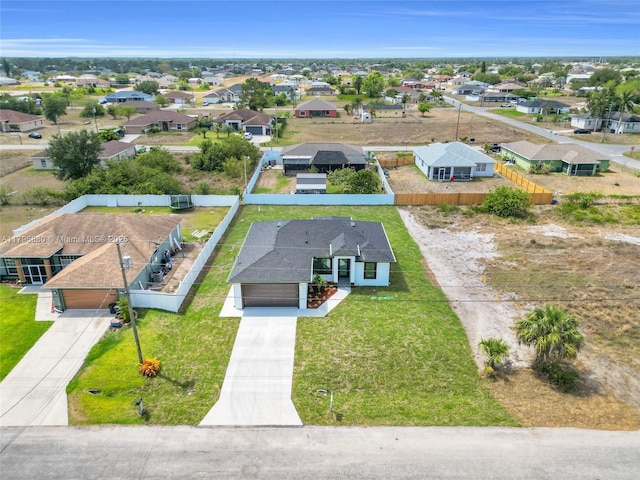 4115 20th St SW, Lehigh Acres, FL 33397 - drone / aerial view featuring a residential view