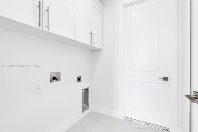 4115 20th St SW, Lehigh Acres, FL 33397 - washroom with cabinet space, marble finish floor, hookup for an electric dryer, baseboards, and hookup for a washing machine