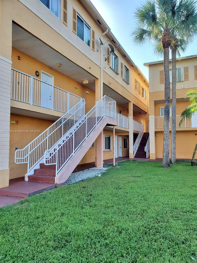view of property with stairway
