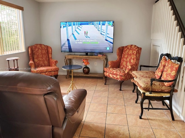 living room with light tile patterned floors