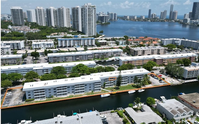 drone / aerial view with a water view and a view of city