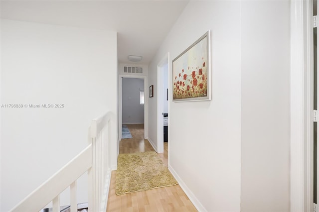 1110 Canella Ln, Hollywood, FL 33019 - corridor with light wood-style floors and visible vents
