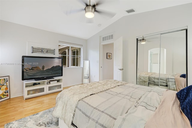 1110 Canella Ln, Hollywood, FL 33019 - bedroom with lofted ceiling, a closet, visible vents, and wood finished floors