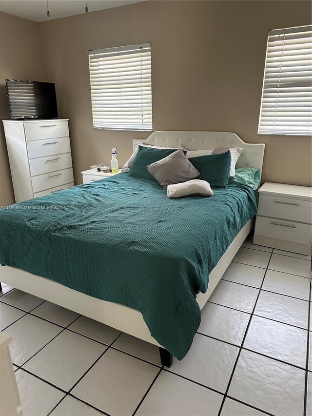 4671 SW 43rd Ter, Dania Beach, FL 33314 - bedroom featuring light tile patterned floors