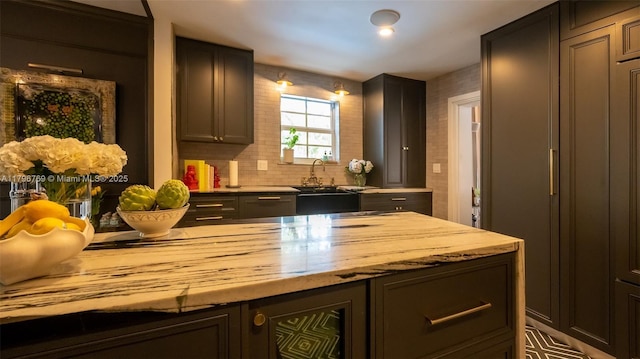 kitchen featuring butcher block counters and a sink