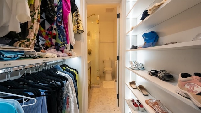 walk in closet featuring visible vents