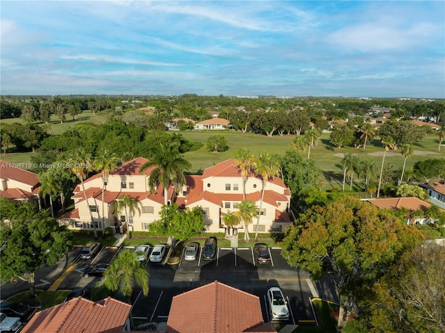bird's eye view featuring golf course view and a residential view