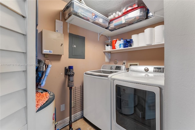 clothes washing area with independent washer and dryer, laundry area, and electric panel