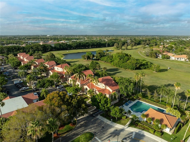 bird's eye view with view of golf course, a water view, and a residential view