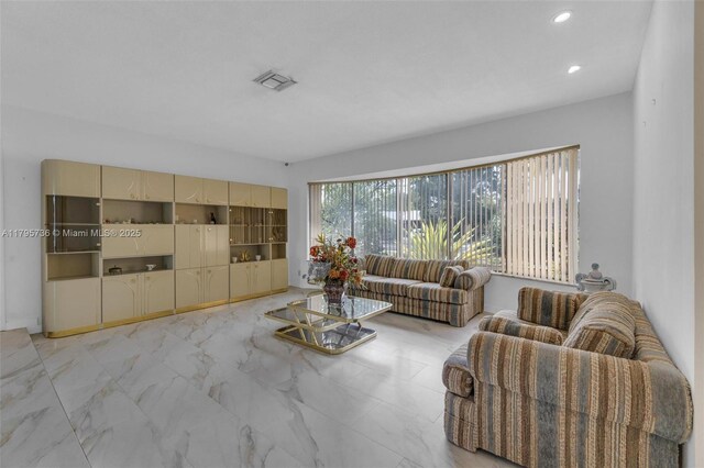 5101 N 37th St, Hollywood, FL 33021 - living area featuring visible vents, marble finish floor, and recessed lighting