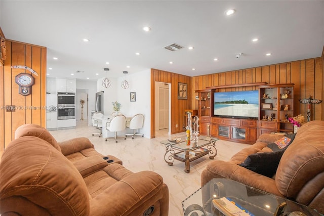 5101 N 37th St, Hollywood, FL 33021 - living area with marble finish floor, recessed lighting, wooden walls, and visible vents