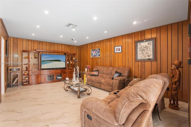 5101 N 37th St, Hollywood, FL 33021 - living area featuring wooden walls, marble finish floor, visible vents, and recessed lighting