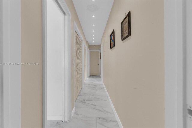 5101 N 37th St, Hollywood, FL 33021 - hallway with marble finish floor, baseboards, and recessed lighting