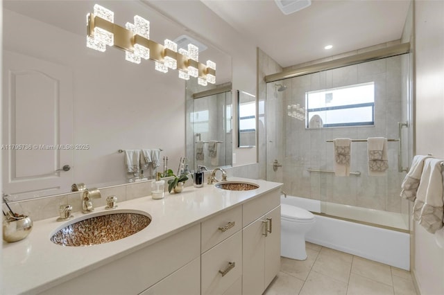 5101 N 37th St, Hollywood, FL 33021 - full bath featuring toilet, tile patterned flooring, double vanity, and a sink