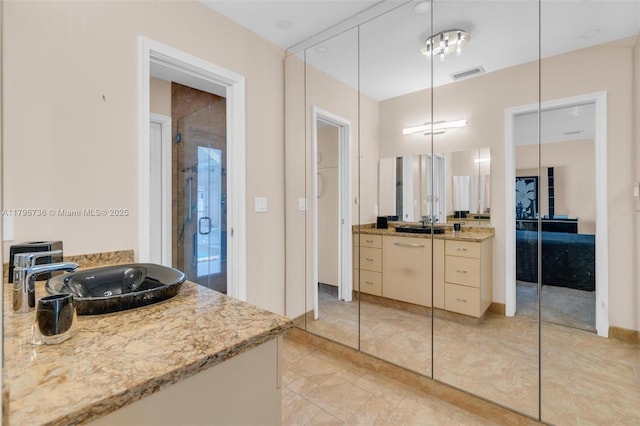 5101 N 37th St, Hollywood, FL 33021 - full bathroom with vanity, a shower stall, and visible vents