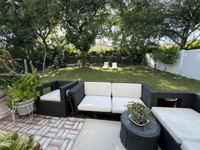 view of patio featuring an outdoor hangout area and a fenced backyard