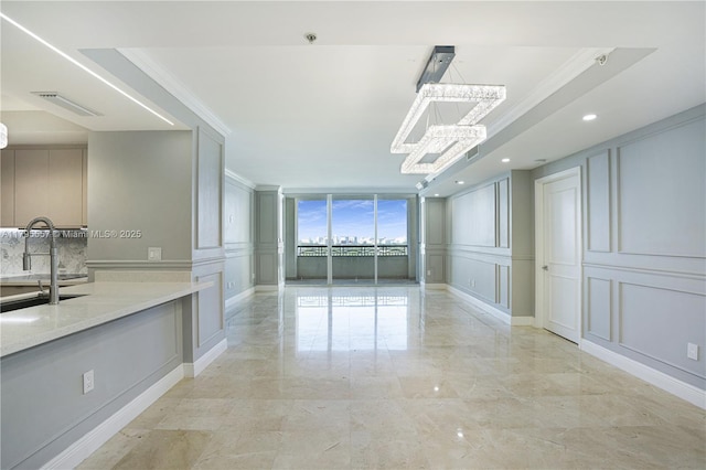 3400 SW 27th Ave Unit 1506, Miami, FL 33133 - unfurnished room featuring an inviting chandelier, visible vents, a decorative wall, and ornamental molding