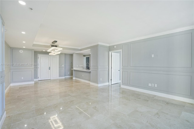 3400 SW 27th Ave Unit 1506, Miami, FL 33133 - empty room with marble finish floor, a decorative wall, crown molding, and a chandelier