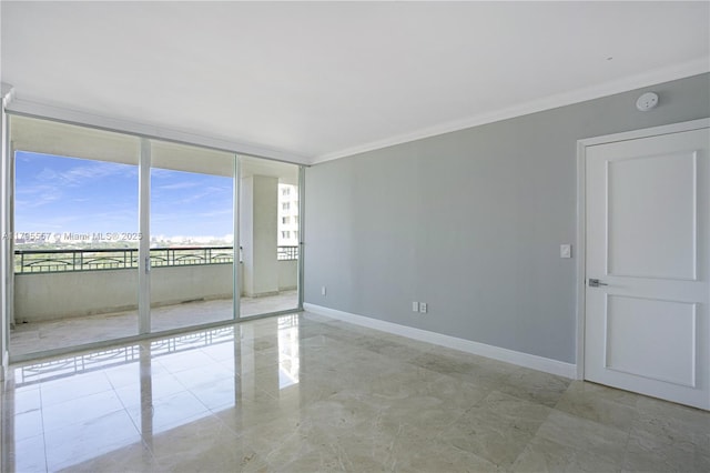 3400 SW 27th Ave Unit 1506, Miami, FL 33133 - empty room with crown molding, a wall of windows, and baseboards