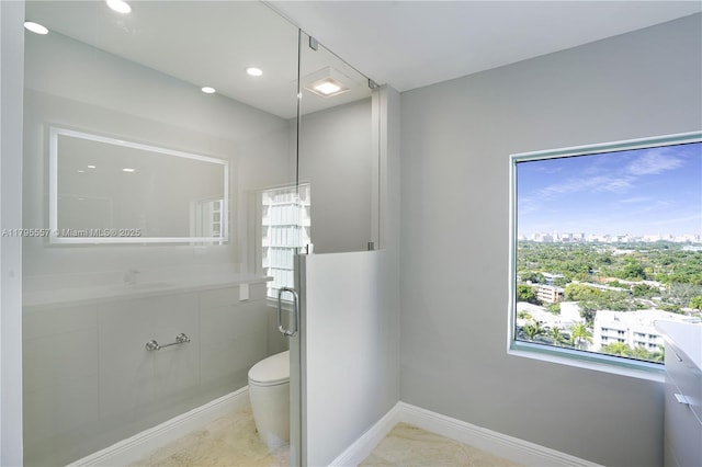 3400 SW 27th Ave Unit 1506, Miami, FL 33133 - bathroom featuring a sink, toilet, recessed lighting, a city view, and baseboards